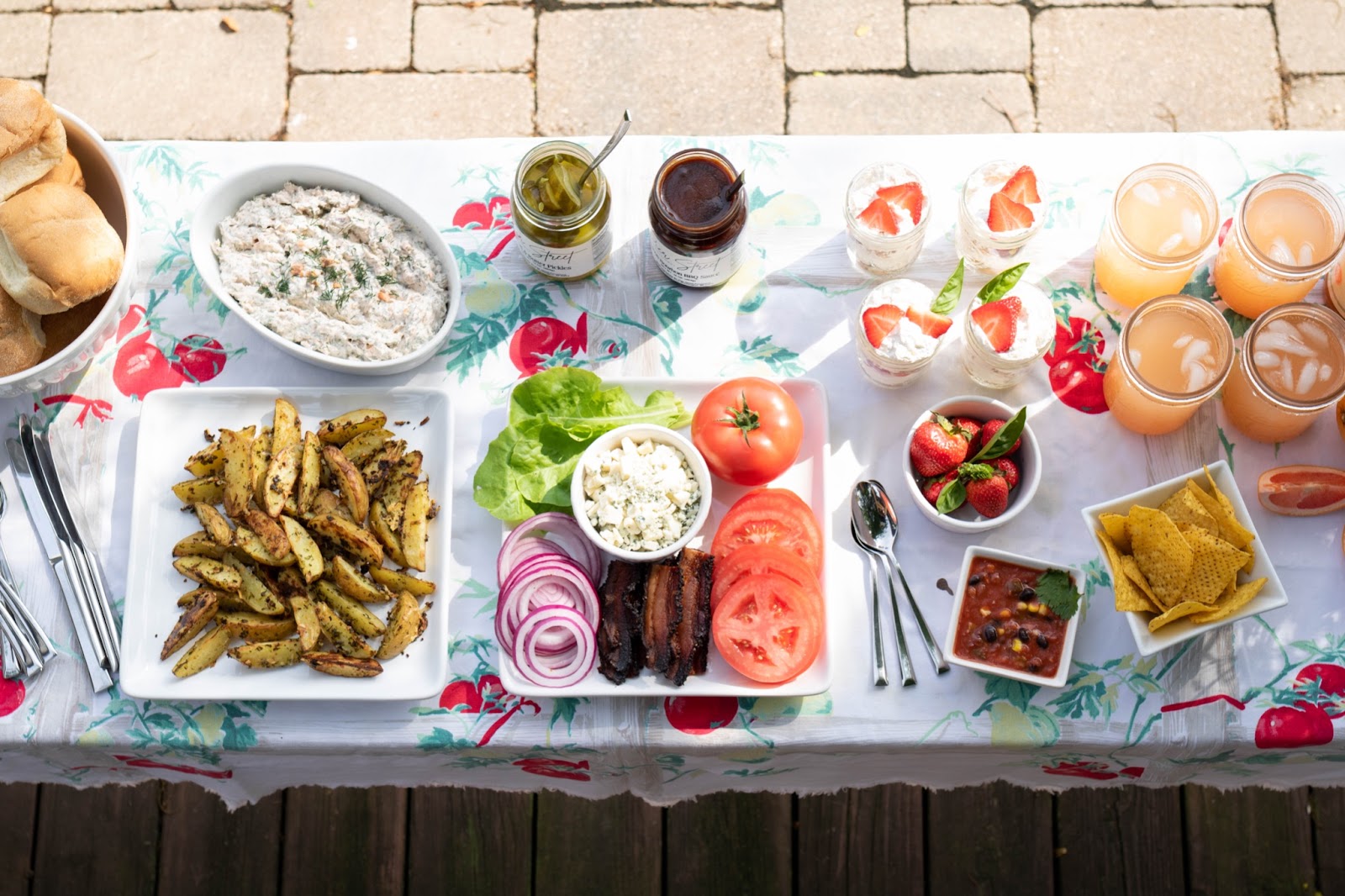 An ultimate backyard barbecue spread. Pear & Simple gift shop in Port Washington, Wisconsin shares their tips for a simple ultimate backyard BBQ
